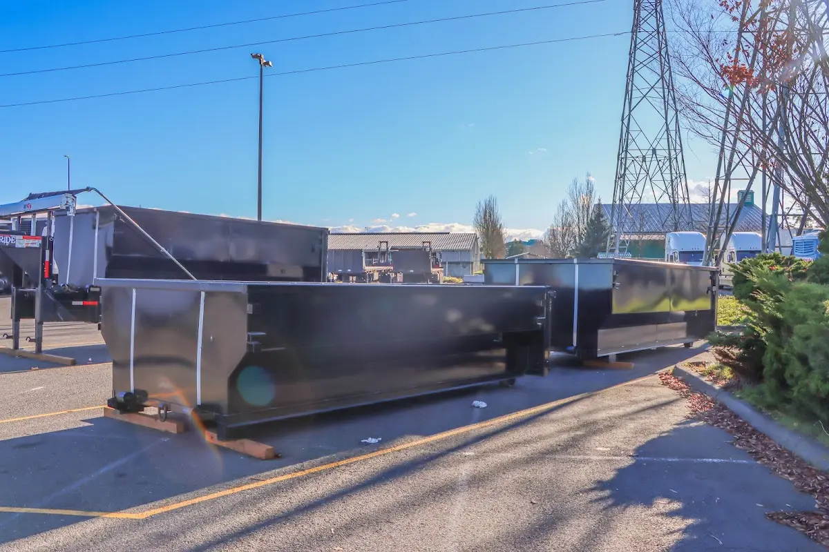 Roll-off dumpster ready for waste disposal at job site for Concrete Dumpster Rental in Northville